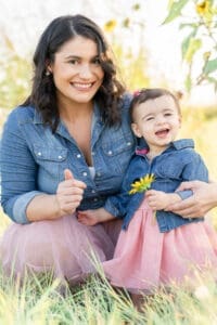 mother and daughter smiling at camera